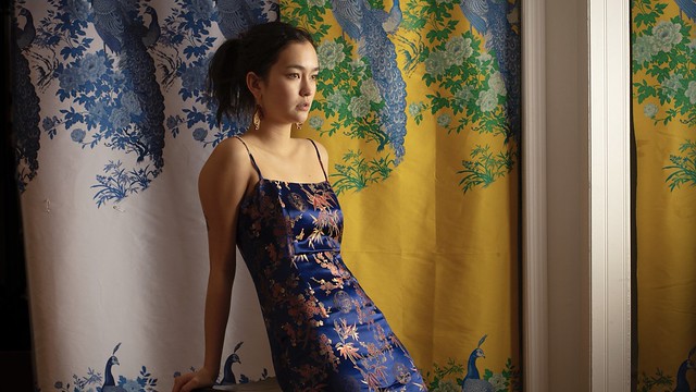 Emilee in blue brocade dress