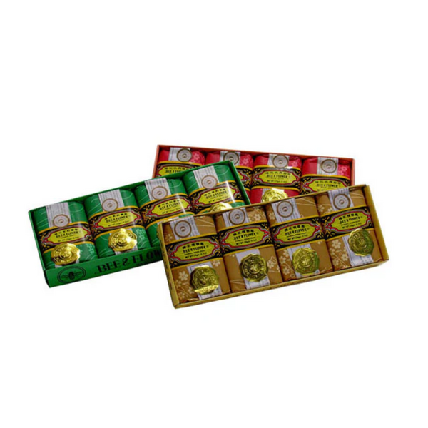 Three boxes of fragrant hand soap in gold, green, and red
