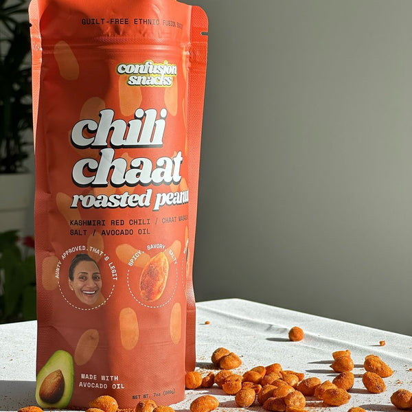 Bag of Chili Chaat Roasted Peanuts beside peanuts