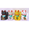 four lucky cats, each in a different color (black, silver, gold, and white)