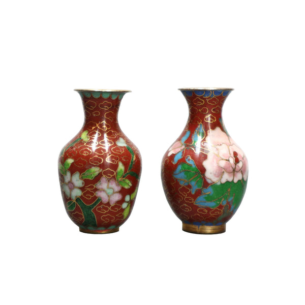 Two maroon cloisonne vases with flowers