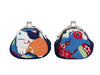 This assortment of soft and plush coin purses depicts an adorable lucky cat design. Sturdy open and close mechanism.